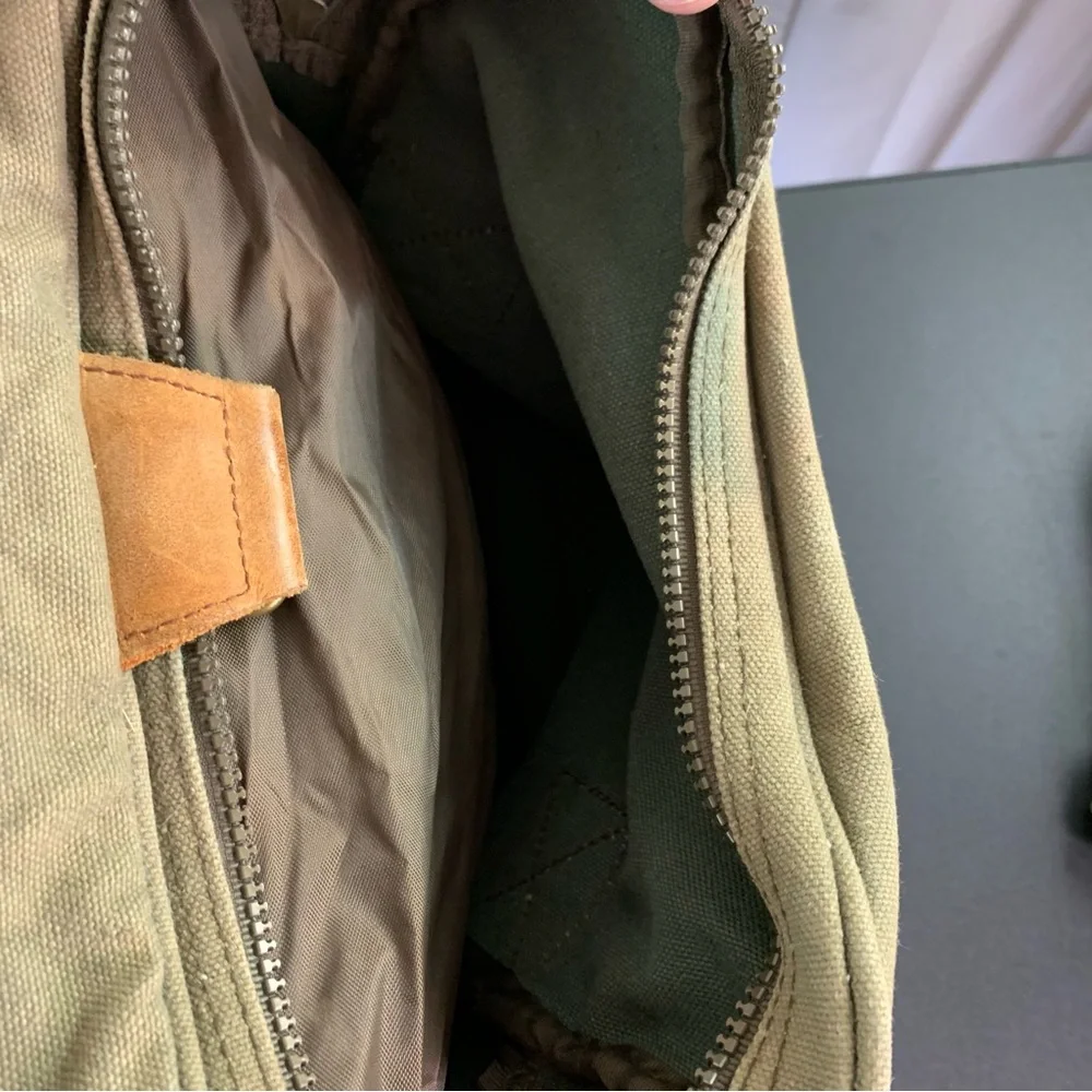 High Sierra Green canvas and Brown leather Duffel Bag.